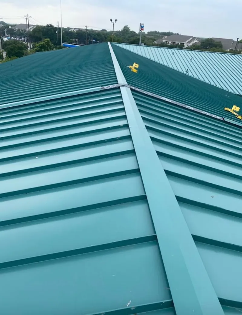 Green commercial metal roof ridge and valley for Metal Roof Repair in Artesia